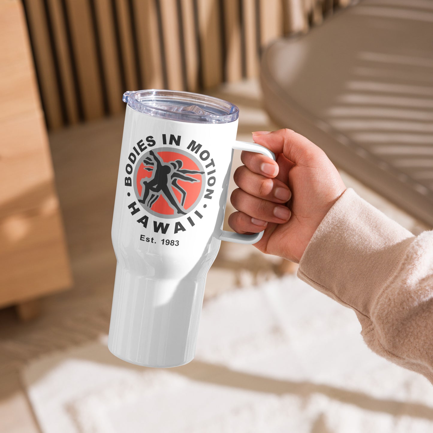 Bodies in Motion Travel mug with a handle